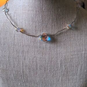 Swarovski Crystal,& sterling silver necklace.  16".  Aura Borealis crystal.. Box